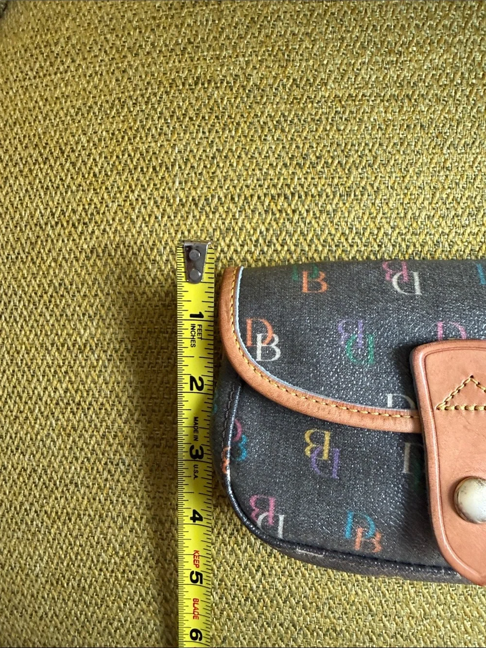 Dooney & Bourke Black Multicolor Monogram Wristlet with Tan Trim